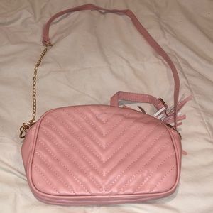 Pink purse with detachable strap